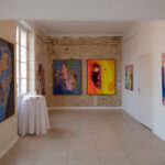 Self-portrait of the poster on the left; portraits of Lieutenant Dieudonné and Mrs Matisse at the rear of the gallery.